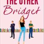 Pink cover with titles at the top, a long thin line of colour books in the background around a third of the way up the cover. In the foreground stands a red-haired woman, hip-cocked, in jeans and a black tank top, on either side of her and back from her, each facing slightly away from her, stand two men, one is wearing a black suit, the other is in jeans and a green top, they both have their arms folded.