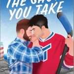 Illustrated cover of two good looking white men in an embrace on a beach with dark sand. A safety beacon/lighthouse of some kind striped in red and white is in the far left background. One man has dark red hair and a beard and is wearing a blue plaid shirt, the other man is wearing a red and blue hockey jersey and is holding a hockey stick. Only their torsos above the waist are showing.