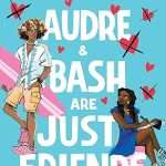 Illustrated cover with a sky blue background and large white titles taking up most of the middle. On the left middle/top is a young handsome Black man wearing shorts and a striped button up shirt (short sleeves) pink crocs. He has dark curly hair with blond tips and he's carrying a pink and white striped surfboard. On the middle/bottom right is a young and pretty Black girl with long braids, wearing a blue dress and sitting on a pile of pink books. She's writing in a notebook and looking back over her shoulder at the young man.